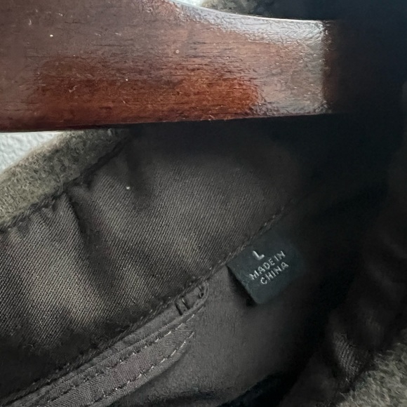 Shirt  jacket with a curved hem and stand collar. - Picture 3 of 3